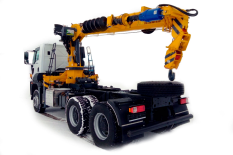 Бурокранова машина з краном-маніпулятором та буровим шнеком